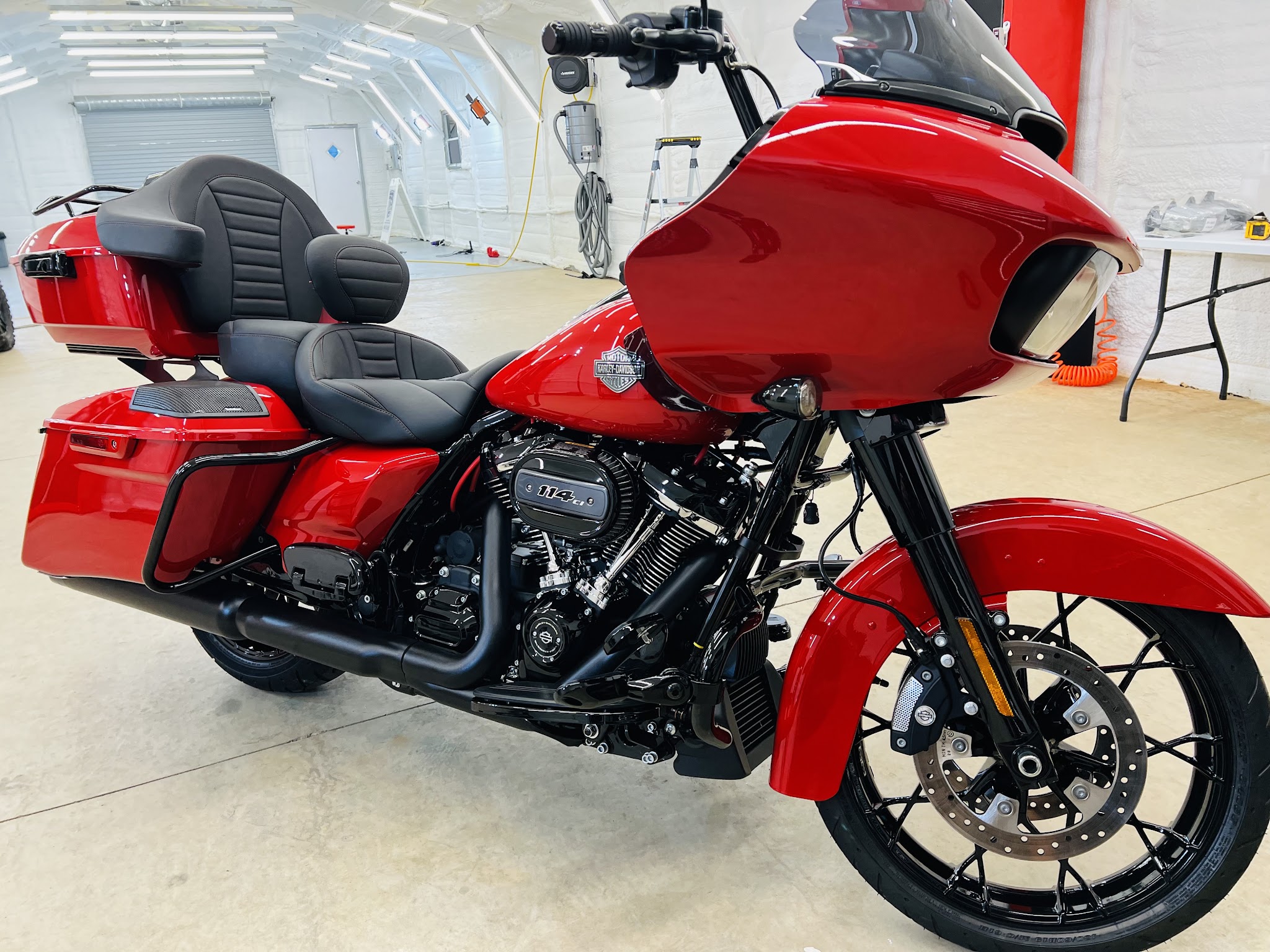 Red Harley-Davidson Road Glide detailed in the shop